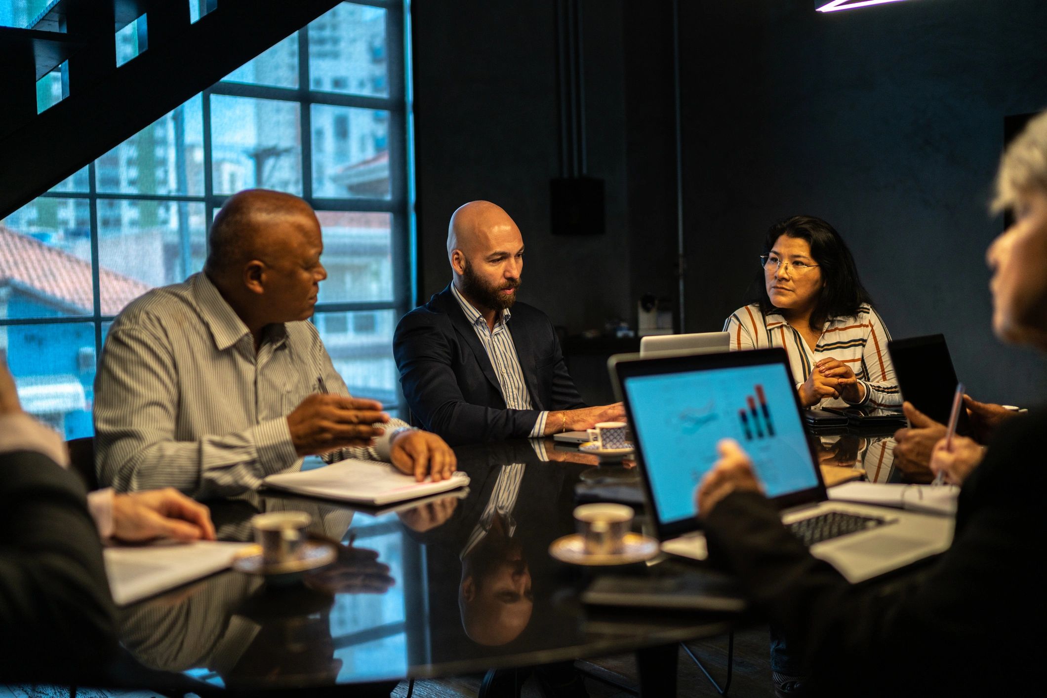 Business leaders in a boardroom meeting